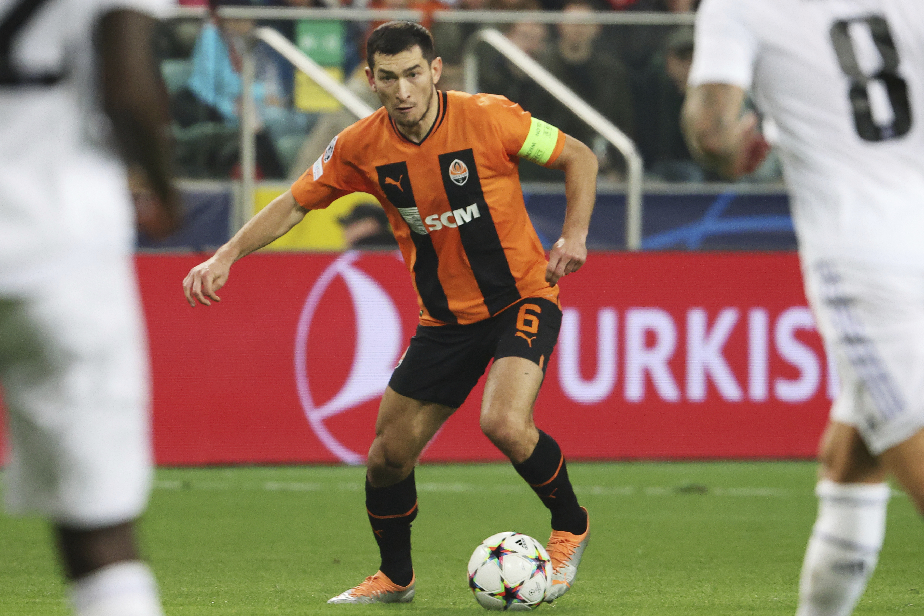 FILE - Shakhtar's Taras Stepanenko controls the ball during the Champions League group F soccer match between Shakhtar Donetsk and Real Madrid at Polish Army Stadium stadium in Warsaw, Poland, Tuesday, Oct. 11, 2022. Team captain Taras Stepanenko told The Associated Press on Monday that Shakhtar's opening Champions League game against Porto on Tuesday is part of his team's duty to represent Ukraine and show his country's resilience. 