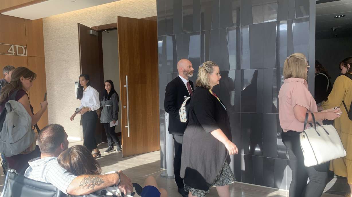 Kevin Franke and his attorneys walk into a conference room following a juvenile court hearing on Sept. 18. On Wednesday, Franke filed for divorce from his wife Ruby Franke, a popular YouTube vlogger charged with abusing their children.