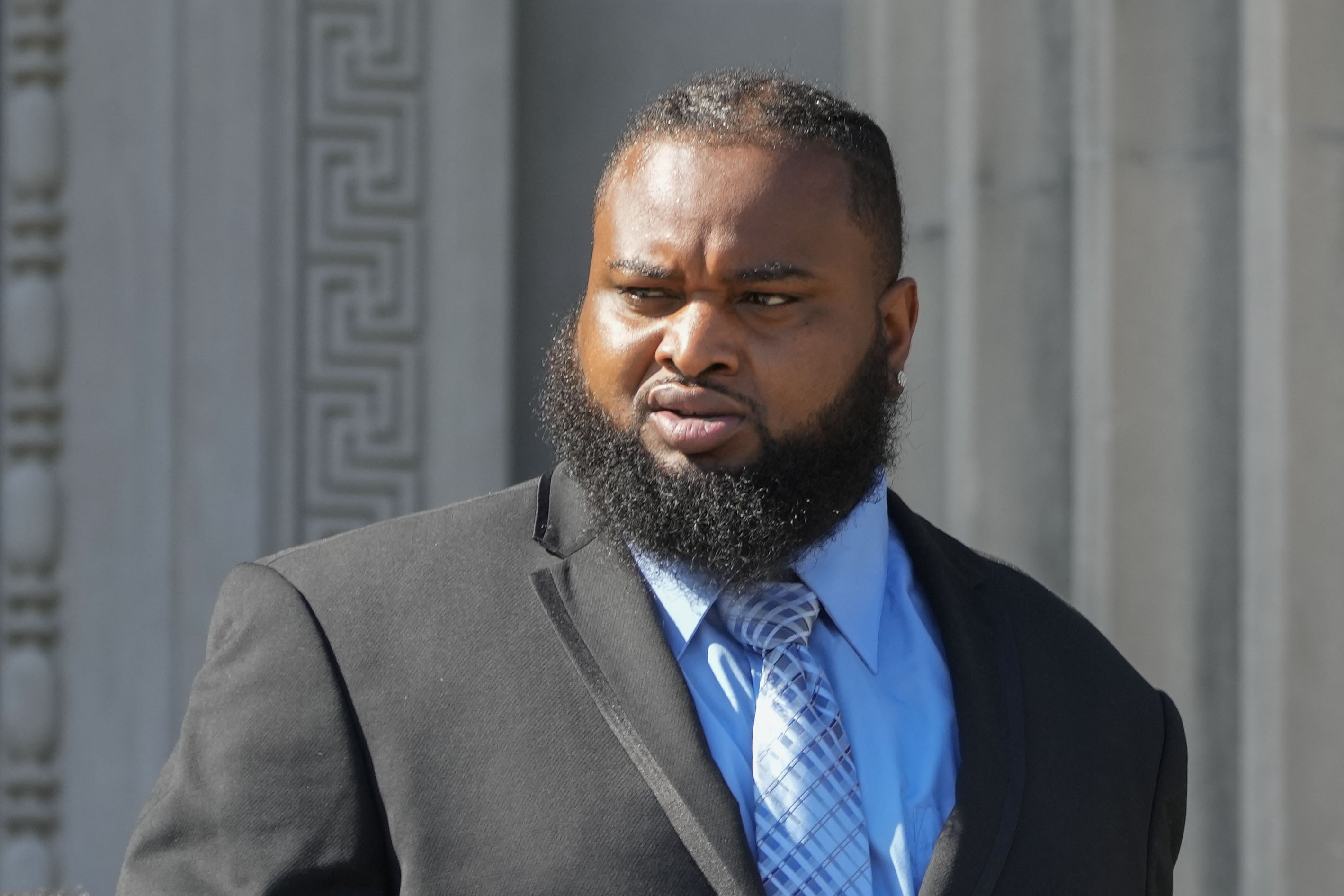 Cardell Hayes leaves Orleans Parish Criminal District Court in New Orleans, Monday, Sept. 18, 2023, after a hearing regarding his retrial for shooting former NFL star Will Smith. Hayes fatally shot Smith, who had retired from the New Orleans Saints, and wounded his wife, in a confrontation after a 2016 traffic crash. 