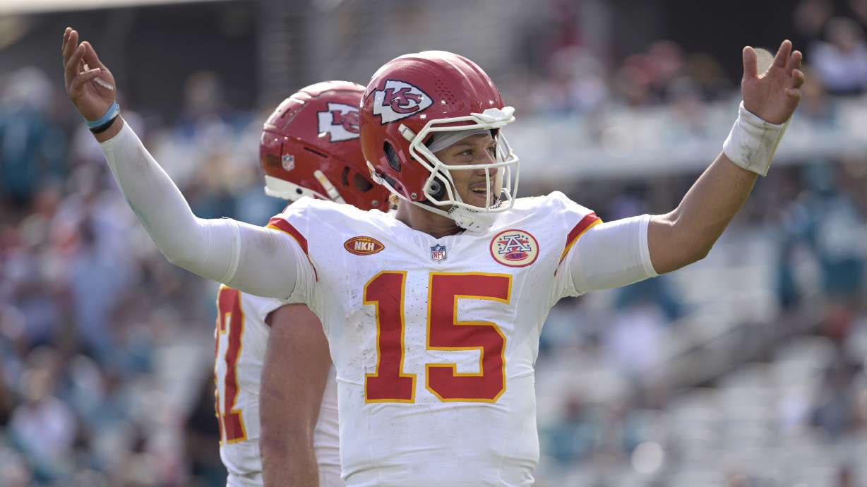 Kansas City Chiefs quarterback Patrick Mahomes (15) gestures to the crowd during the second half of an NFL football game against the Jacksonville Jaguars, Sunday, Sept. 17, 2023, in Jacksonville, Fla.