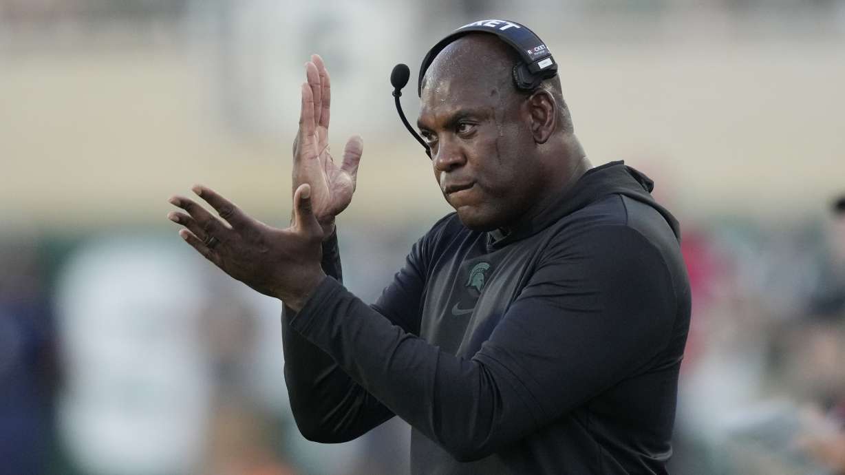 Michigan State head coach Mel Tucker signals from the sideline during the first half of an NCAA college football game against Central Michigan, Friday, Sept. 1, 2023, in East Lansing, Mich.
