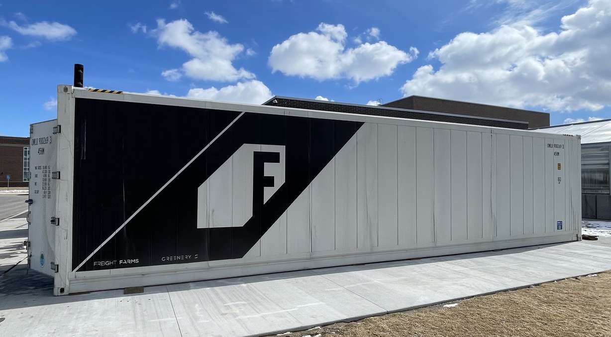 An outside look at the Freight Farms grow container on Cedar Valley High School grounds.