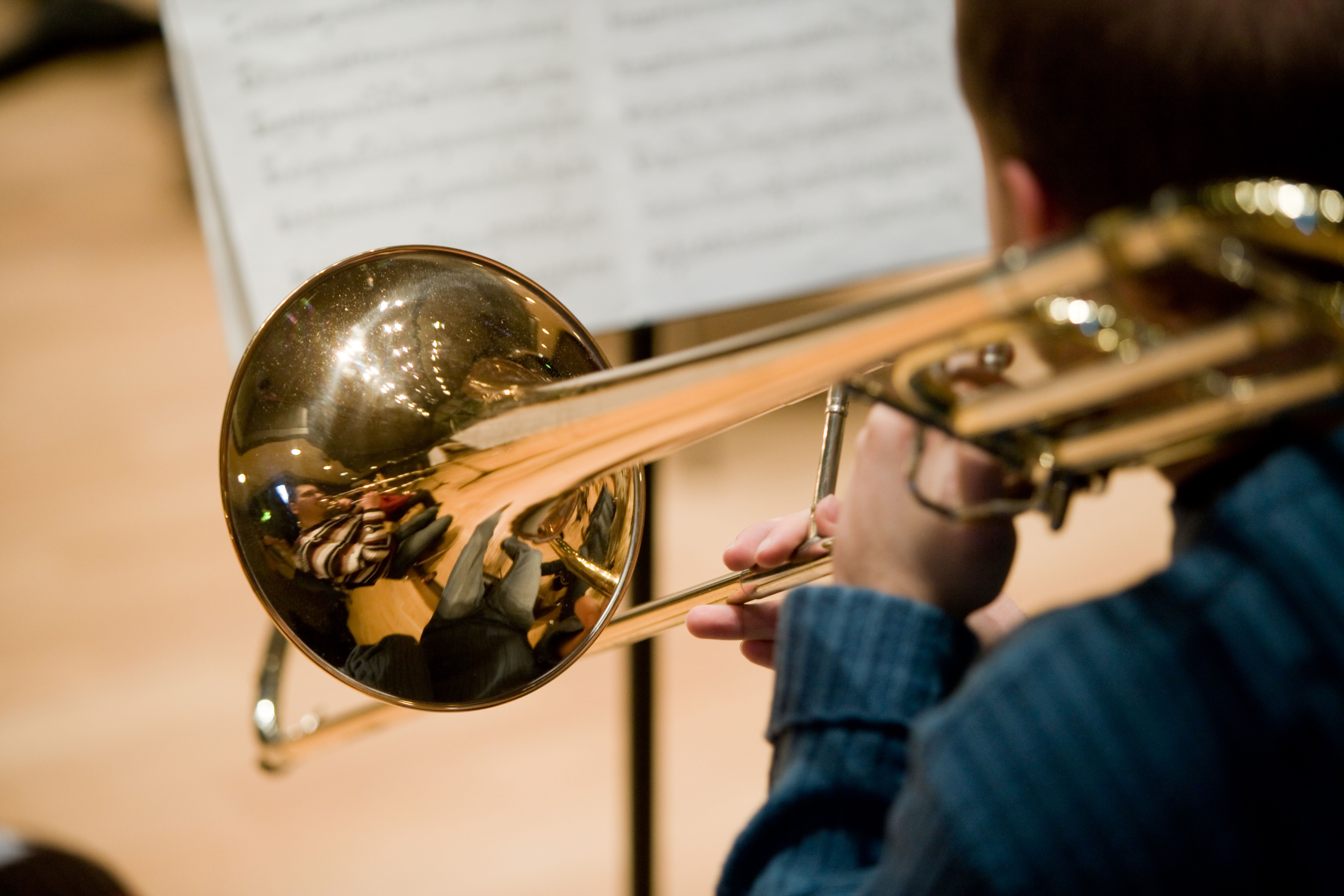 An Alabama high school band director was shocked with a stun gun and arrested after Birmingham police said he wouldn't tell his band to stop playing.