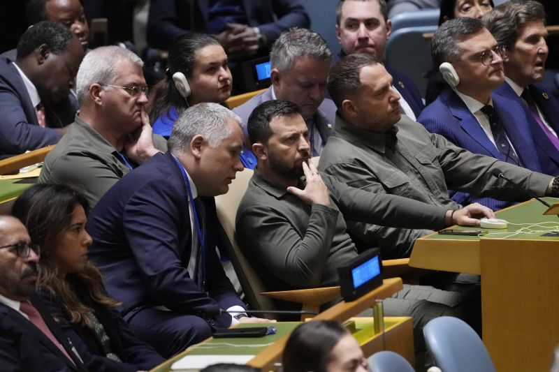 Ukrainian President Volodymyr Zelenskyy listens as President Joe Biden addresses the 78th United Nations General Assembly in New York, Tuesday.