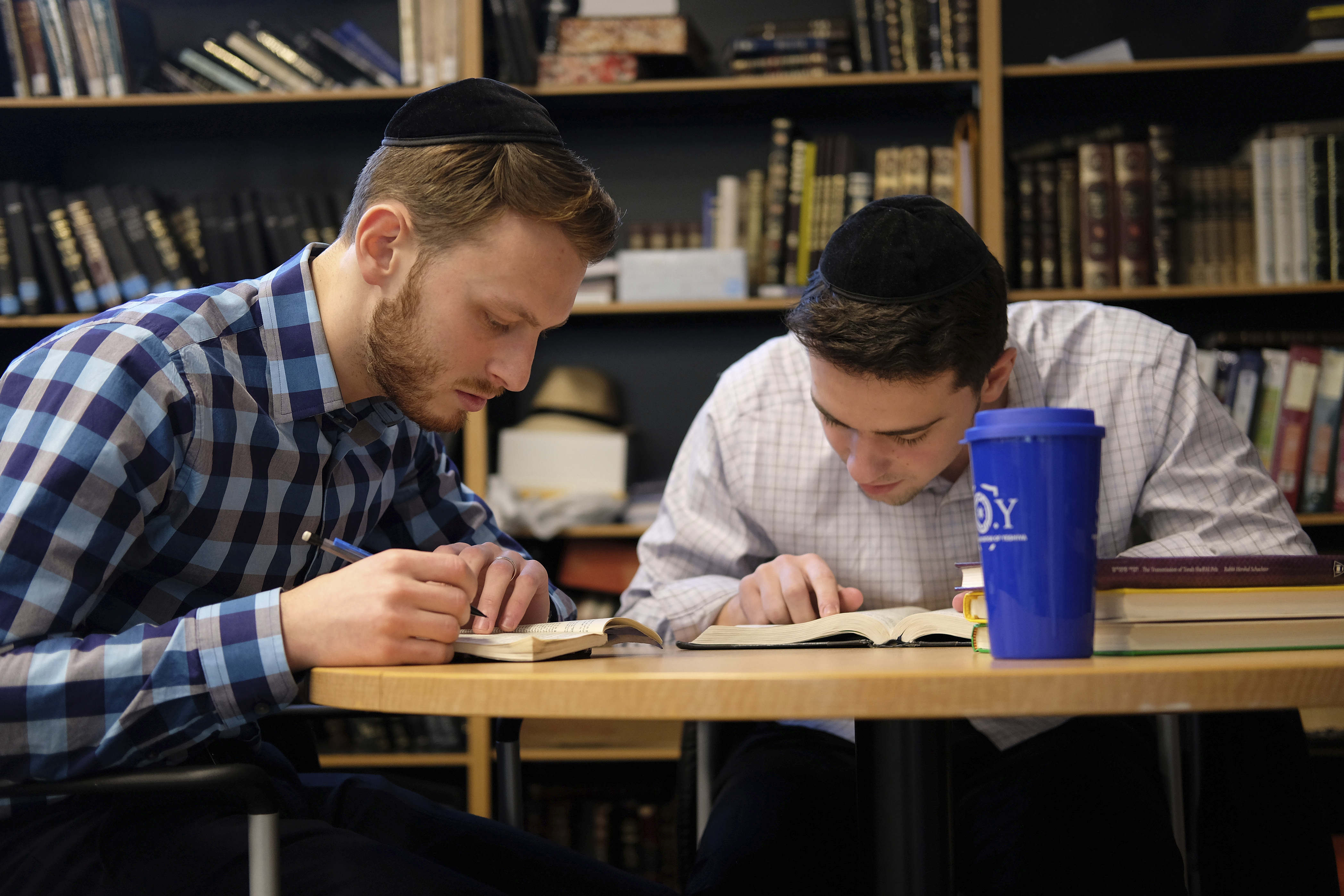Yeshiva University students Aaron Heideman and Marc Shapiro study in New York Dec. 12, 2019. They praised President Donald Trump's executive order to expand the scope of potential anti-Semitism complaints on U.S. college campuses.
