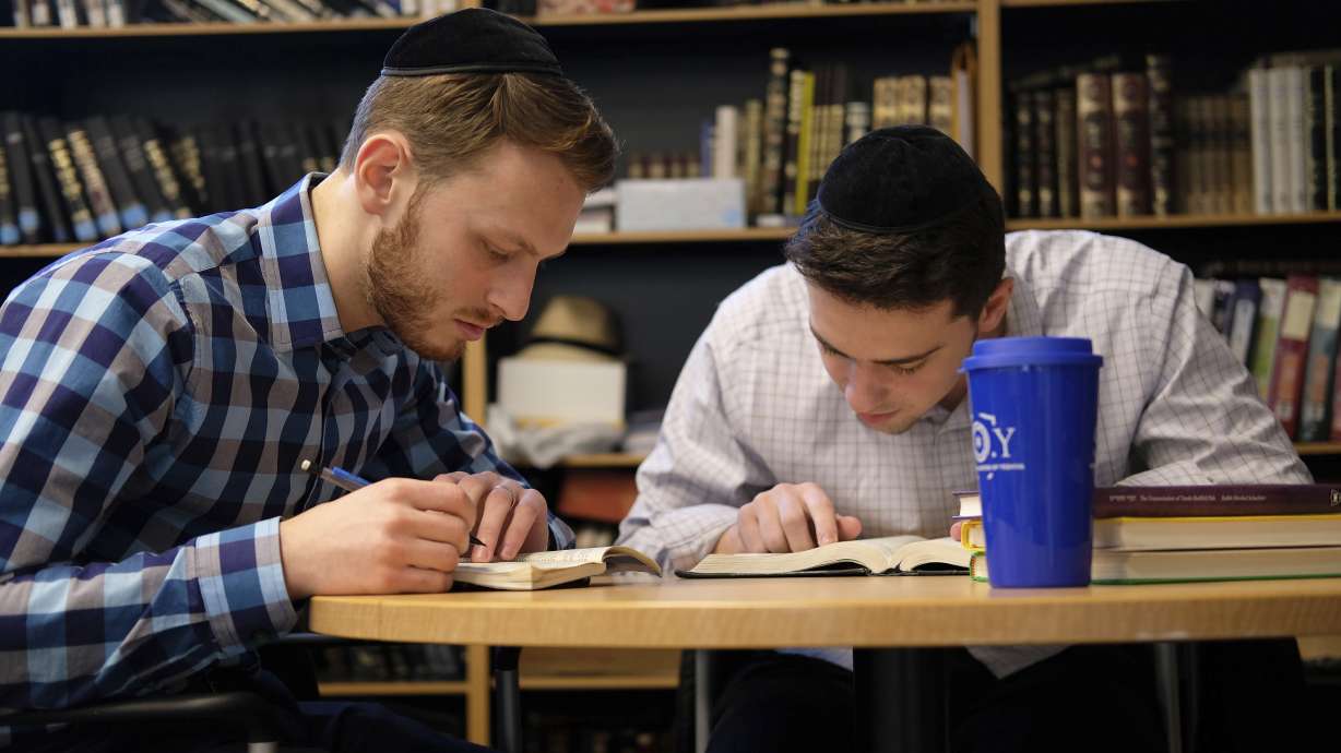 Yeshiva University students Aaron Heideman and Marc Shapiro study in New York Dec. 12, 2019. They praised President Donald Trump's executive order to expand the scope of potential anti-Semitism complaints on U.S. college campuses.