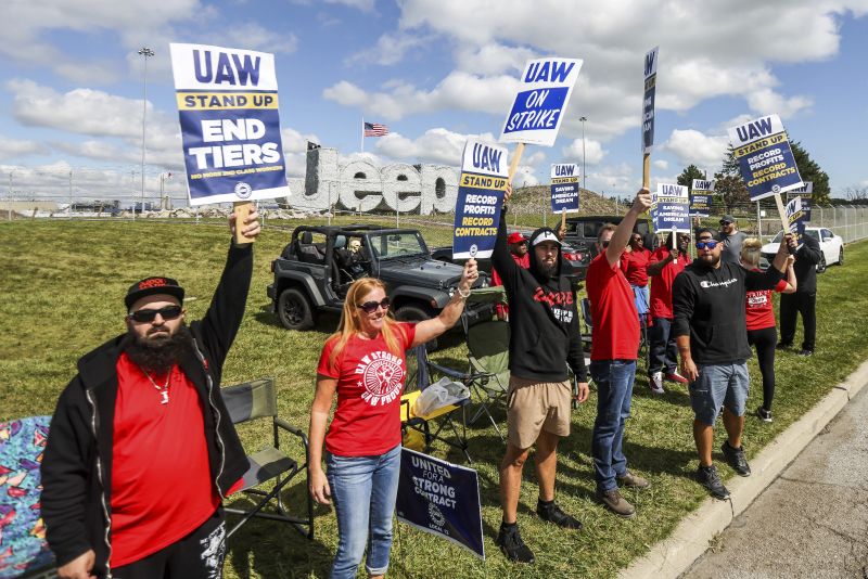 United Auto Workers from engine team 50 man the picket line outside the Stellantis Toledo Assembly Complex on Monday in Toledo, Ohio.