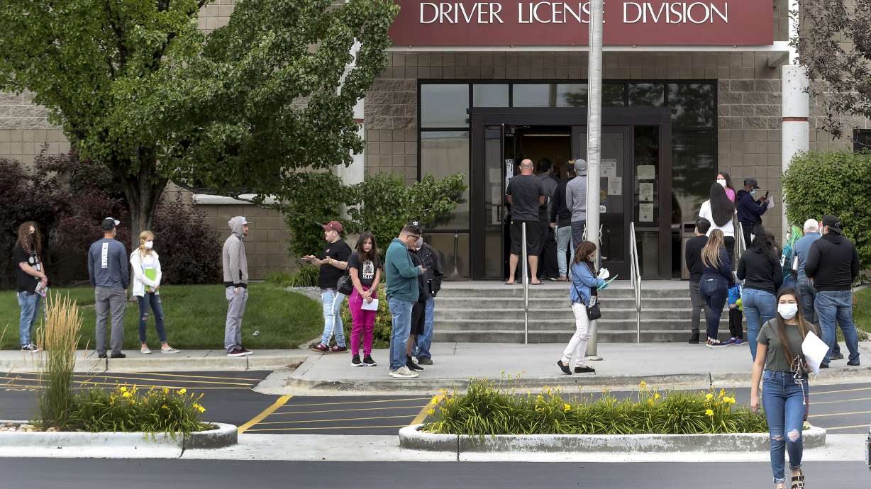 People wait at the Utah Driver License Division office in West Valley City on June 29, 2020. The division has more than doubled the number of languages in which residents can be tested for a driver's license.