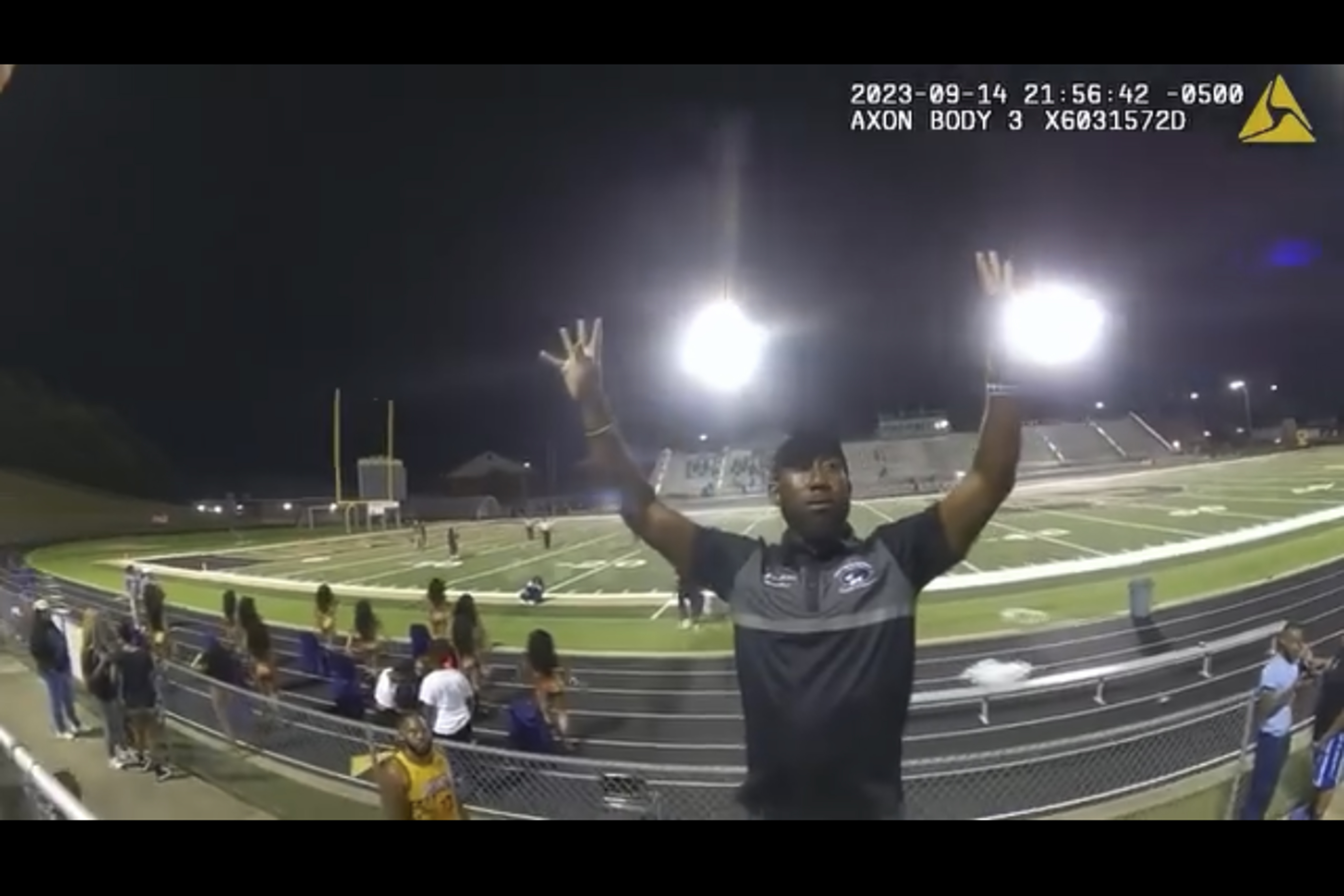 In an image made from video released by the Birmingham Police Dept., a high school band director is seen before he being tasered and arrested after refusing to stop his band from playing after a football game, Thursday, Sept. 14, 2023, in Birmingham, Ala. 