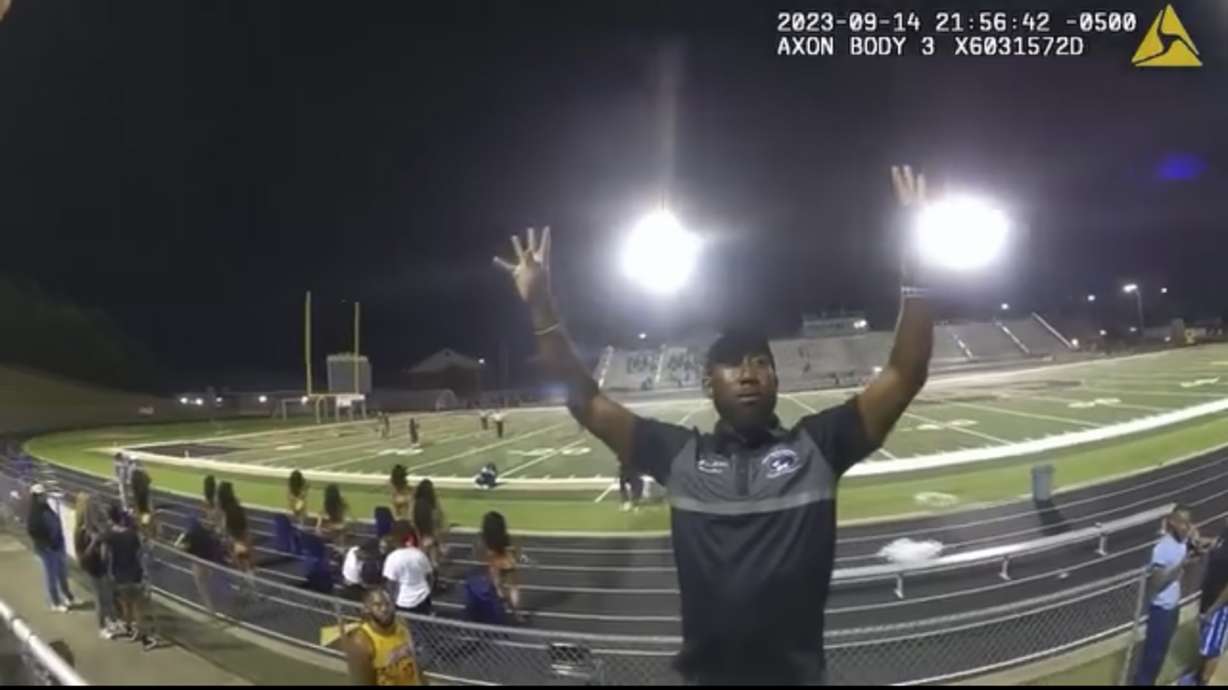 In an image made from video released by the Birmingham Police Dept., a high school band director is seen before he being tasered and arrested after refusing to stop his band from playing after a football game, Thursday, Sept. 14, 2023, in Birmingham, Ala.