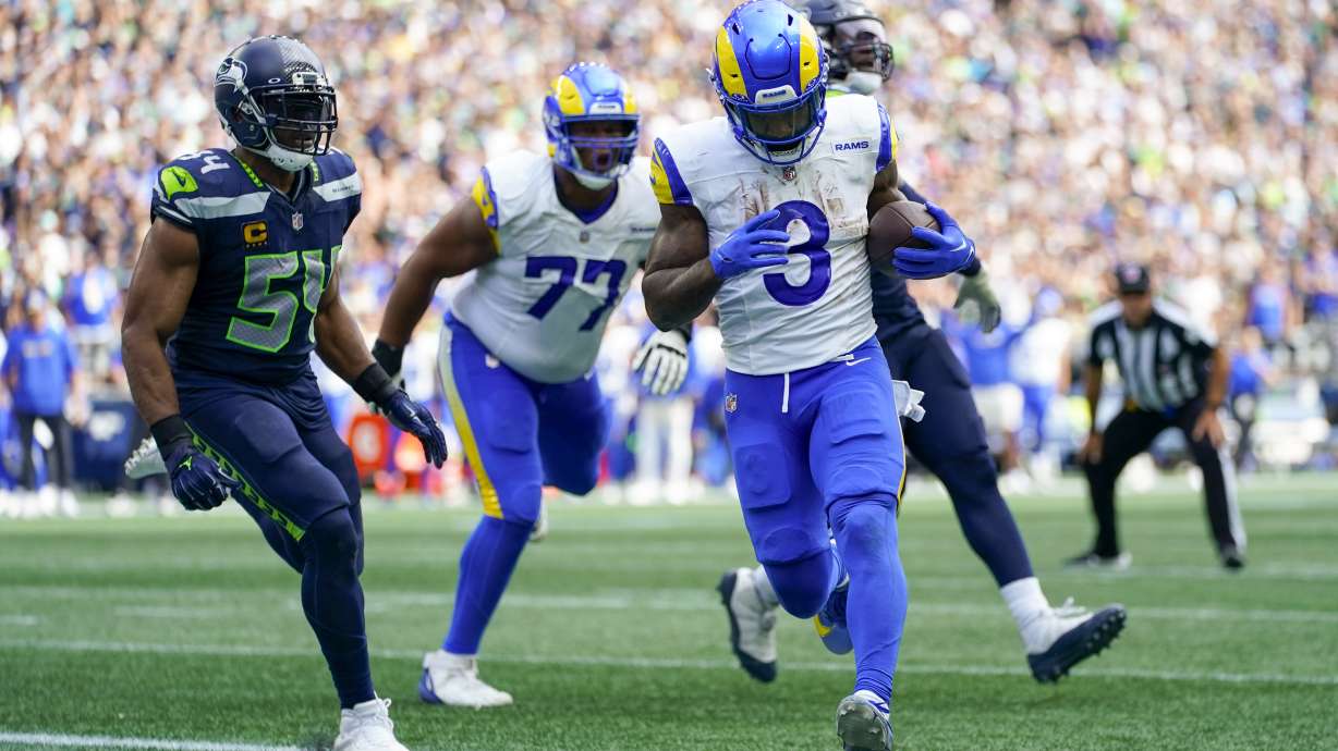 Los Angeles Rams running back Cam Akers scores against the Seattle Seahawks during the second half of an NFL football game Sunday, Sept. 10, 2023, in Seattle.