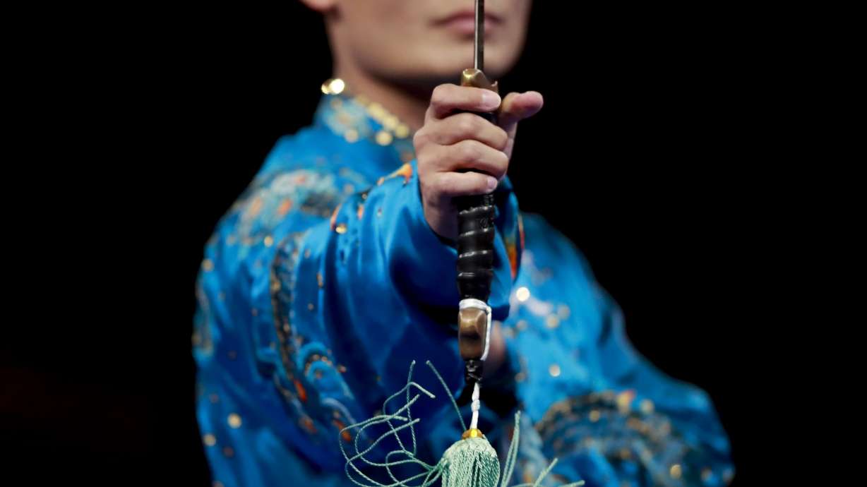 FILE - Kazahastan's Askarbay Yedibayev competes during his taijijian wushu performance at the 18th Asian Games in Jakarta, Indonesia, on Aug. 22, 2018. The Asian Games open officially on Saturday, Sept. 23, 2023.