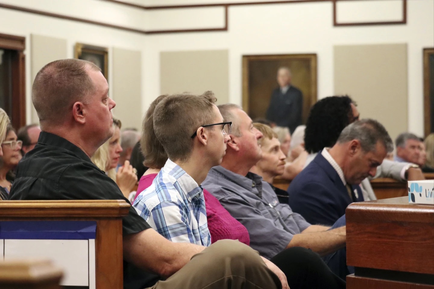 Relatives of Gloria Satterfield, a dead housekeeper who allegedly had millions of dollars stolen from her estate by convicted murderer Alex Murdaugh and former attorney Cory Fleming sit in court, Thursday in Beaufort, S.C.