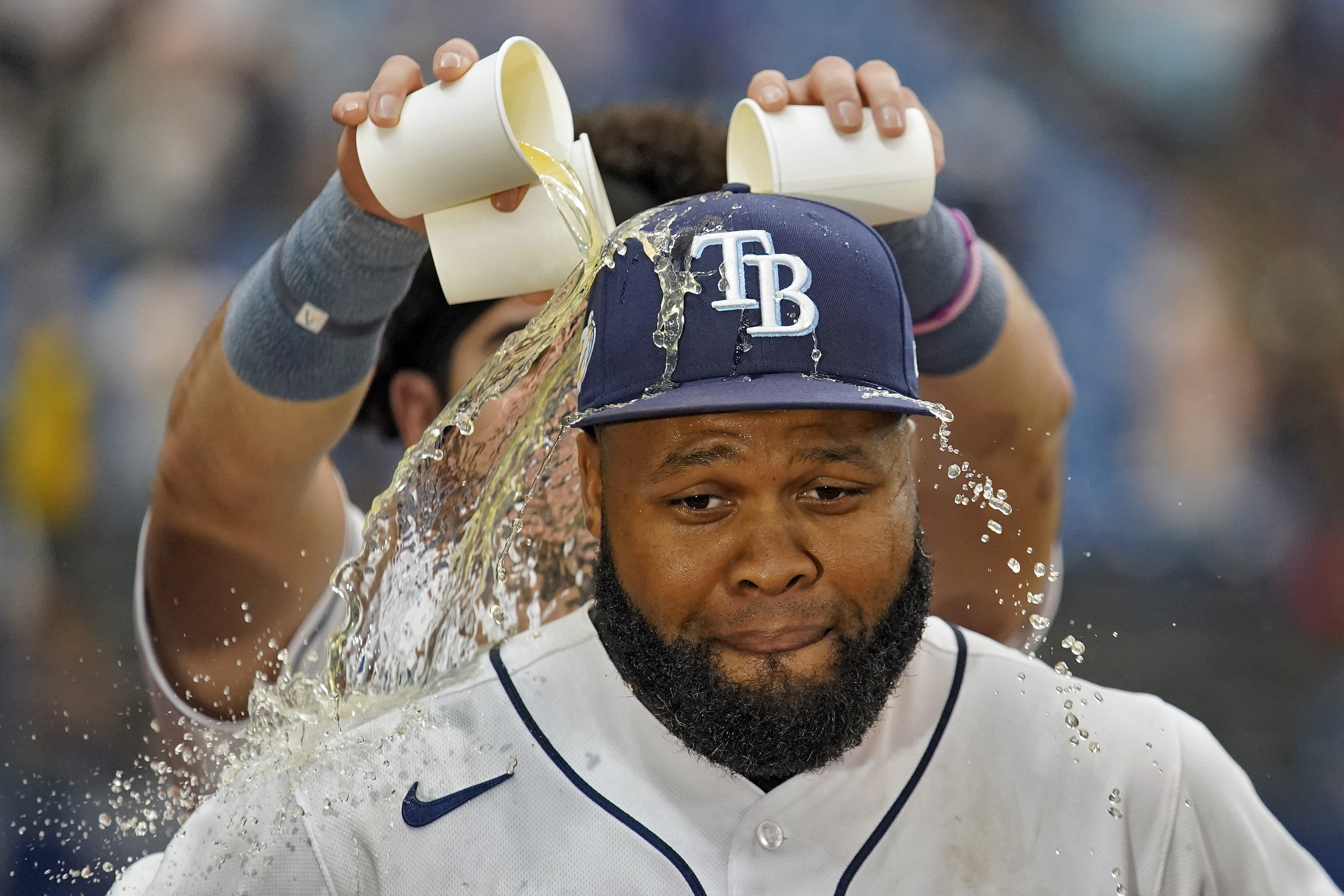 Tampa Bay Rays' Manuel Margot gets gatorade poured on his head after his walk-off single against Los Angeles Angels relief pitcher Carlos Estevez during the ninth inning of a baseball game Thursday, Sept. 21, 2023, in St. Petersburg, Fla.