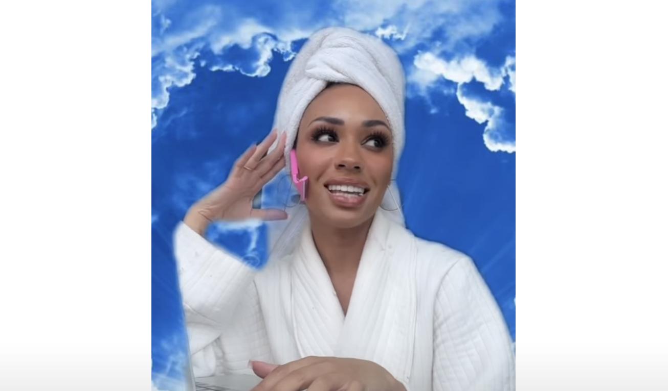 Taryn Delanie Smith embodies her character Denise, the heaven receptionist, in a YouTube video.