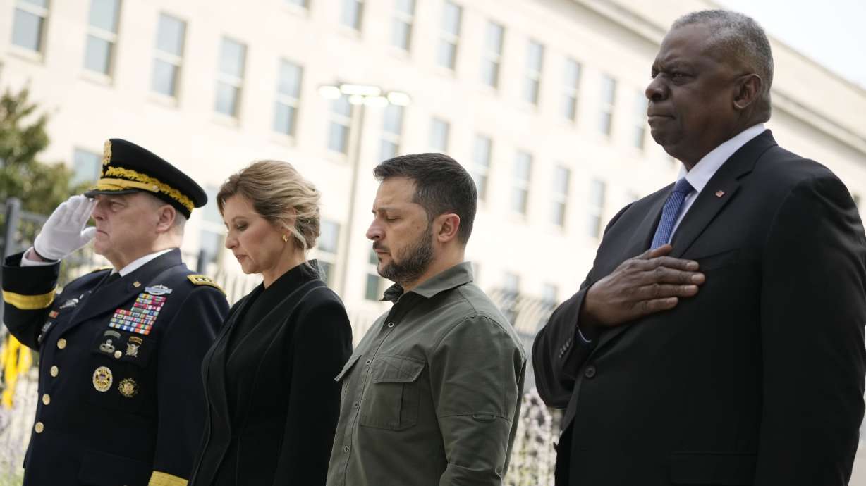 From left, Chairman of the Joint Chiefs Gen. Mark Milley, first lady of Ukraine Olena Zelenska, Ukrainian President Volodymyr Zelenskyy and Secretary of Defense Lloyd Austin participate in a wreath-laying ceremony at the 9/11 Pentagon Memorial, Thursday in Washington.