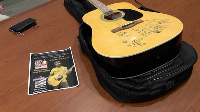 Post Malone donated a signed guitar to the Cottonwood Heights Police Department for auction to raise money for Utah Honor Flights.