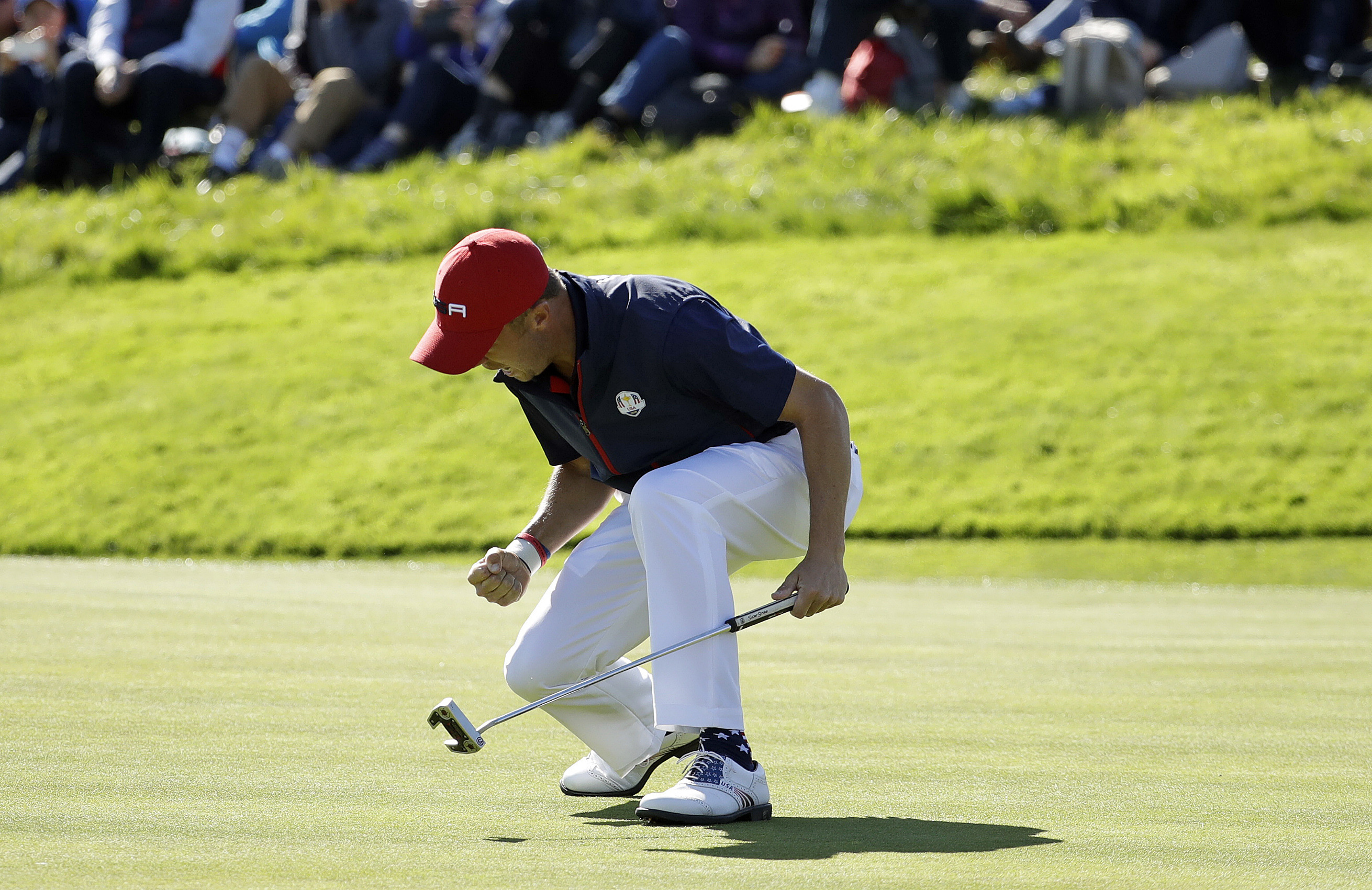 FILE - Justin Thomas of the U.S. celebrates after winning the 8th hole during a singles match on the final day of the 42nd Ryder Cup at Le Golf National in Saint-Quentin-en-Yvelines, outside Paris, France, Sunday, Sept. 30, 2018. Thomas has become the American that Europeans love to beat because of his emotion.