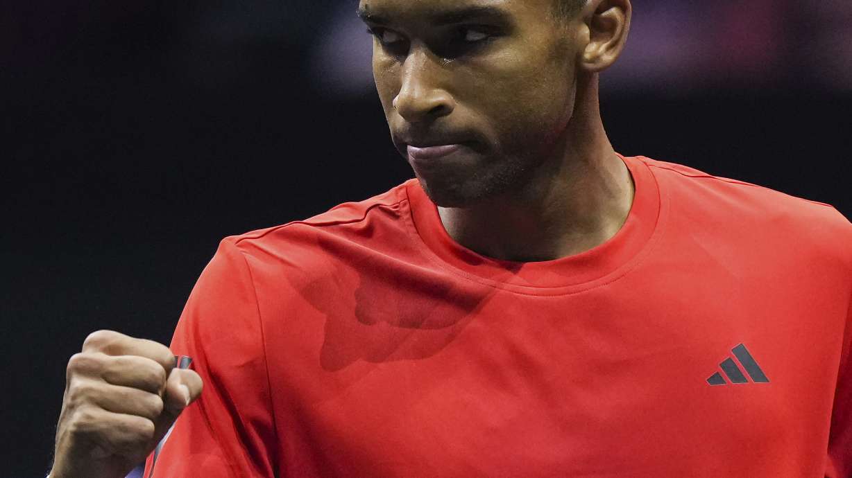 Team World's Felix Auger-Aliassime celebrates a point against Team Europe's Gael Monfils during a Laver Cup tennis match Friday, Sept. 22, 2023, in Vancouver, British Columbia.
