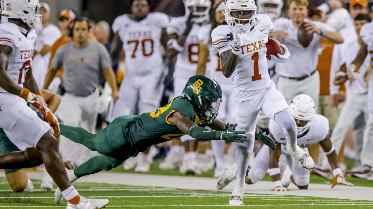 Texas' Xavier Worthy (1) returns a Baylor punt during the first half of an NCAA college football game Saturday, Sept. 23, 2023, in Waco, Texas.