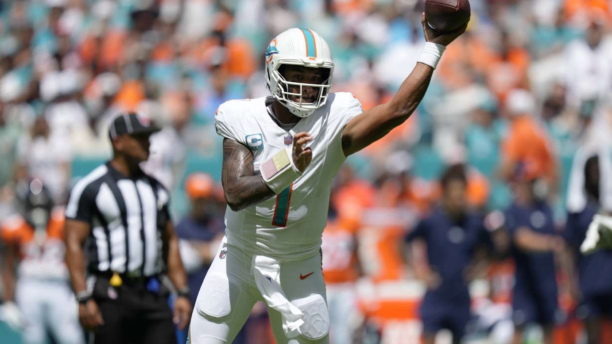 Miami Dolphins quarterback Tua Tagovailoa (1) aims a pass during the first half of an NFL football game against the Denver Broncos, Sunday, Sept. 24, 2023, in Miami Gardens, Fla.