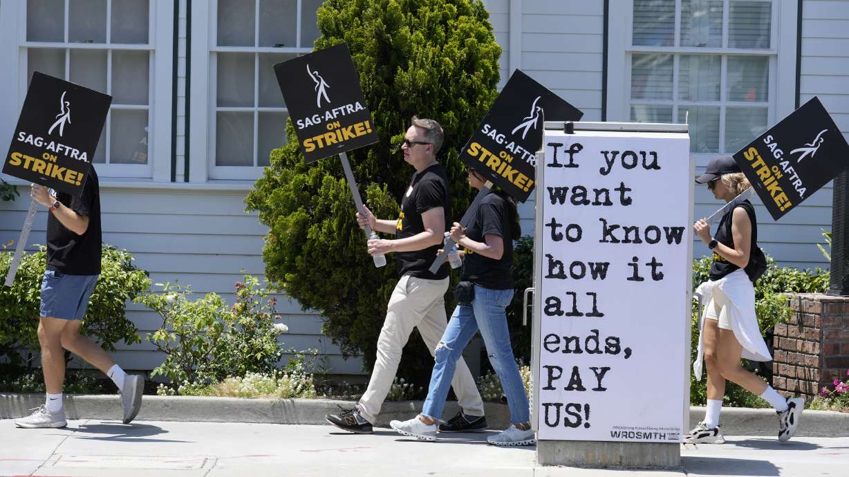 Picketers in Culver City, Calif. on July 17. A tentative agreement between striking screenwriters and Hollywood studios offers some hope the industry’s dual strikes may be over soon.