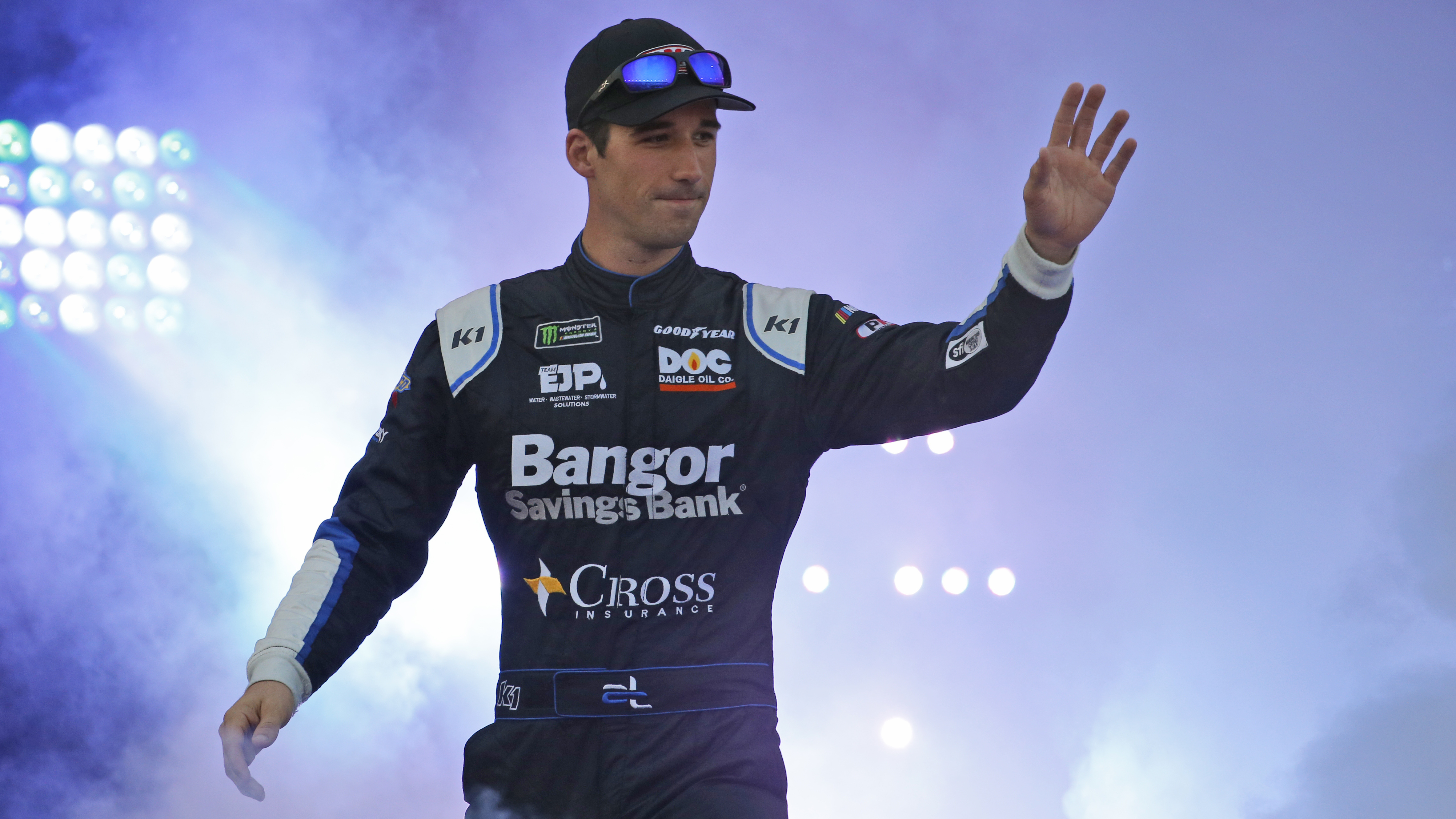 Austin Theriault greets fans during driver introductions for the NASCAR Monster Energy Cup series auto race at Richmond Raceway in Richmond, Va., Sept. 21, 2019. The NASCAR driver-turned-politician wants the opportunity to challenge Democratic U.S. Rep. Jared Golden in Maine. Theriault, who made his announcement on a radio show, said he’ll “come in with fire” to confront issues like inflation, illegal border crossings and dying small towns. The 29-year-old freshman state lawmaker from Fort Kent formally filed his paperwork Monday, Sept. 25, 2023.