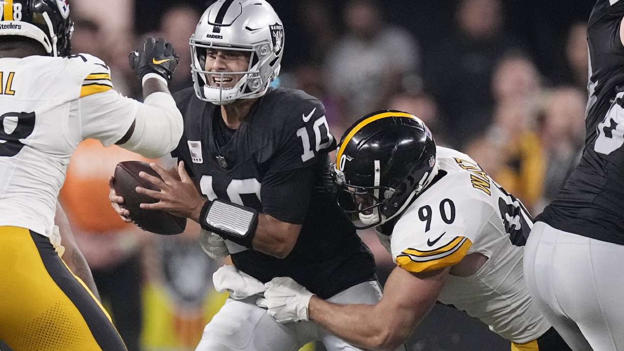 Las Vegas Raiders quarterback Jimmy Garoppolo (10) is sacked by Pittsburgh Steelers linebacker T.J. Watt (90) during the first half of an NFL football game Sunday, Sept. 24, 2023, in Las Vegas.
