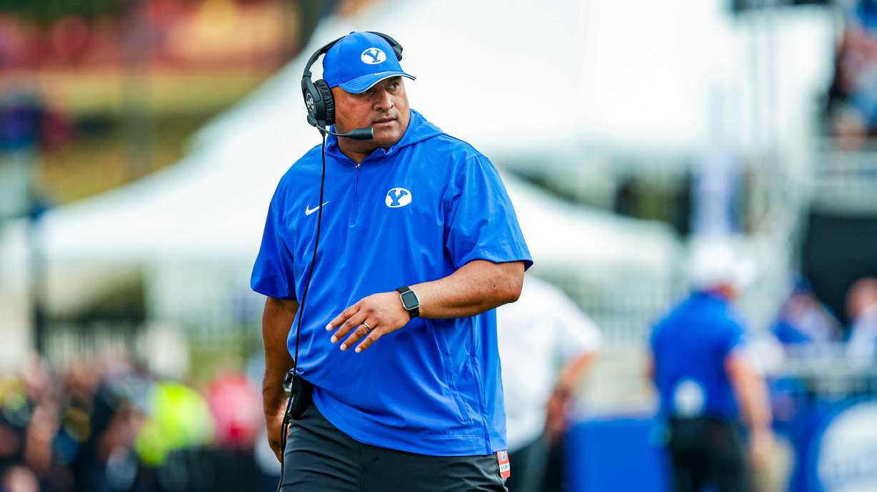 BYU head coach Kalani Sitake looks on during the Cougars' 38-27 loss to Kansas, Saturday, Sept. 23, in Lawrence, Kan., in a Big 12 opener for both teams.
