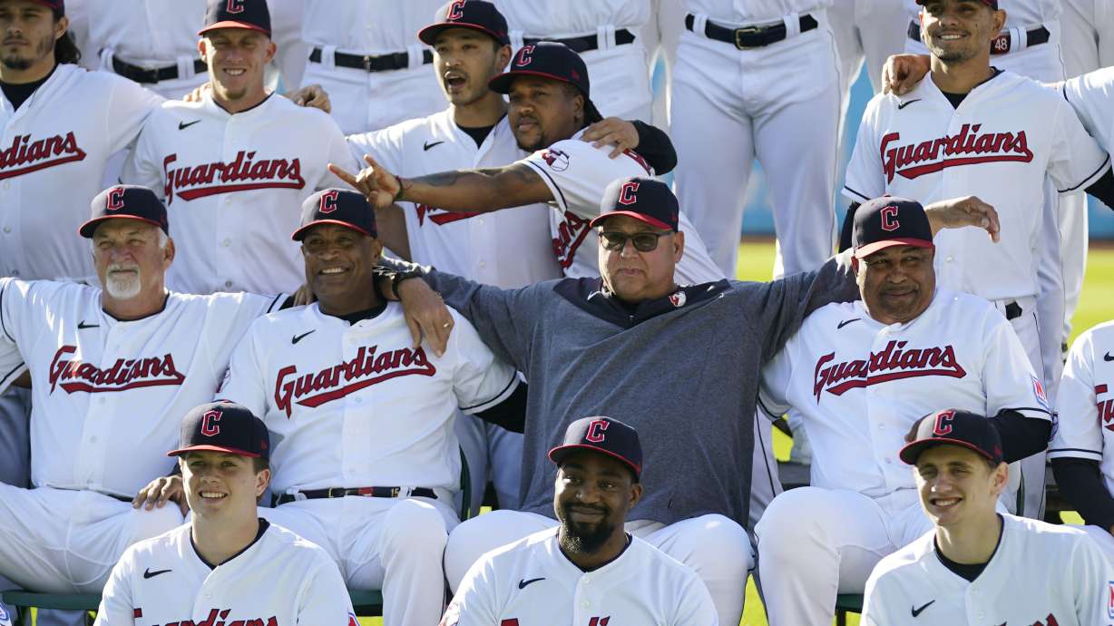 Cleveland Guardians manager Terry Francona, center, poses with the team for a photo before a baseball game against the Baltimore Orioles Friday, Sept. 22, 2023, in Cleveland. Slowed by major health issues in recent years, the personable, popular Francona may be stepping away, but not before leaving a lasting imprint as a manager and as one of the game's most beloved figures.