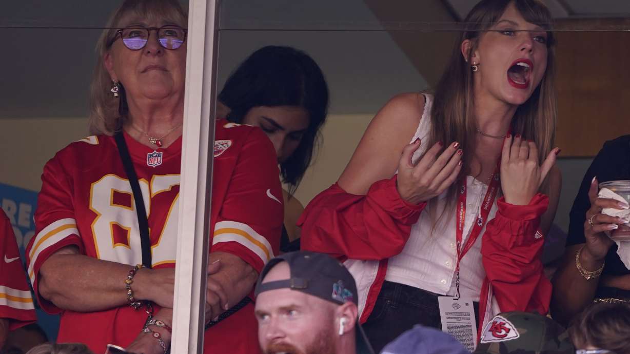 File - Taylor Swift, right, watches from a suite alongside Travis Kelce's mother, Donna Kelce, inside Arrowhead Stadium during the first half of an NFL football game between the Chicago Bears and Kansas City Chiefs Sunday, Sept. 24, 2023, in Kansas City, Mo. Following the 12-time Grammy Award winner's appearance at the game, jersey sales for the All-Pro tight-end seemingly skyrocketed.