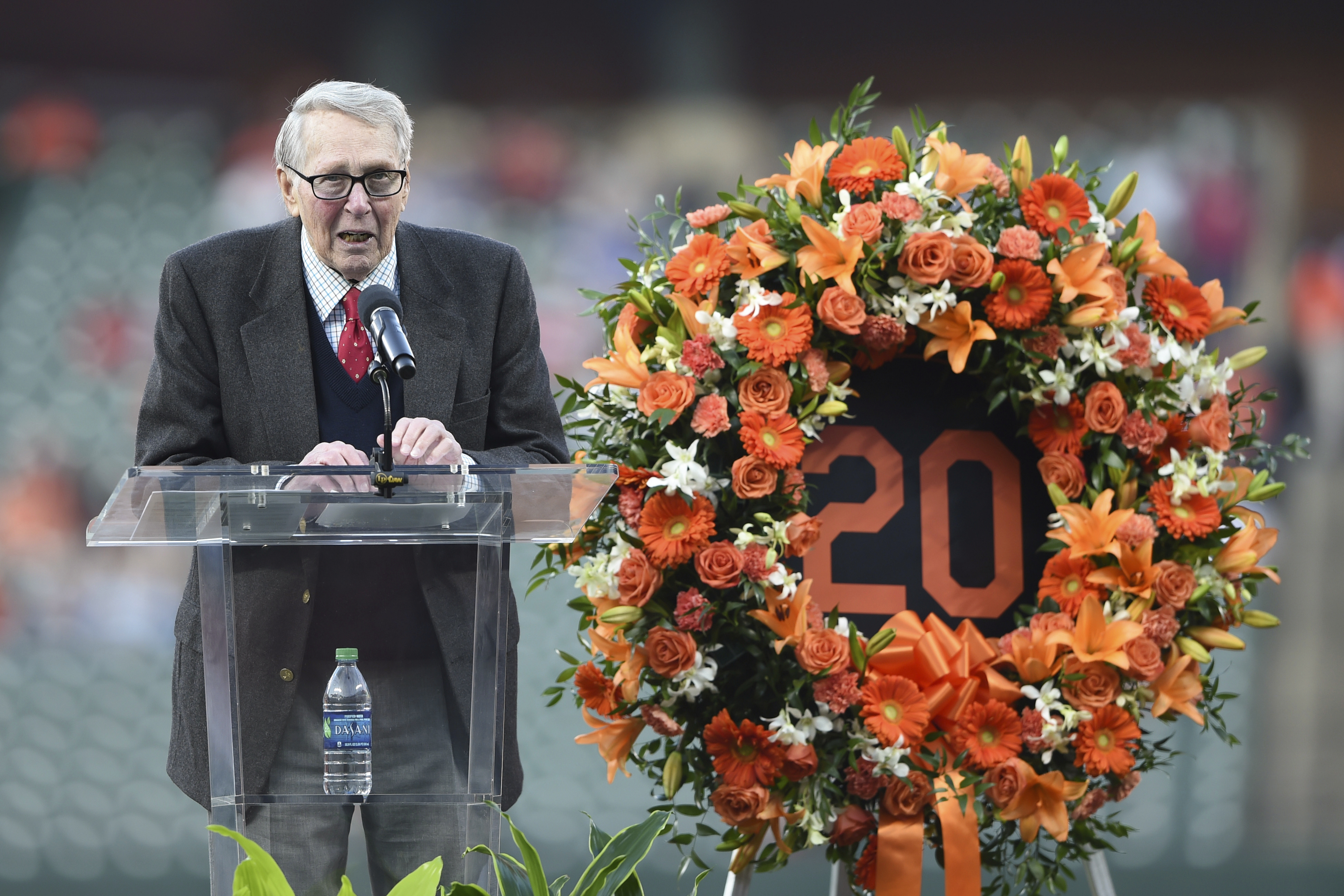 FILE - Former Baltimore Oriole Brooks Robinson speaks during a ceremony in memory of Frank Robinson before a baseball game between the Orioles and the New York Yankees, Saturday, April 6, 2019, in Baltimore. Robinson, whose deft glovework and folksy manner made him one of the most beloved and accomplished athletes in Baltimore history, has died, according to a joint announcement by the Orioles and his family Tuesday, Sept. 26, 2023.