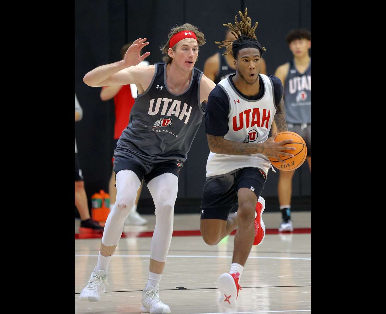 Branden Carlson and Deivon Smith practice with the Utah Runnin’ Utes at the Jon M. and Karen Huntsman Basketball Facility in Salt Lake City on Tuesday, Sept. 26, 2023.