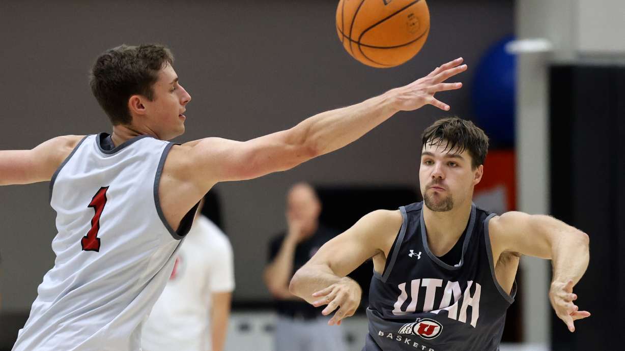 Ben Carlson and Rollie Worster practice with the Utah Runnin’ Utes at the Jon M. and Karen Huntsman Basketball Facility in Salt Lake City on Tuesday, Sept. 26, 2023.
