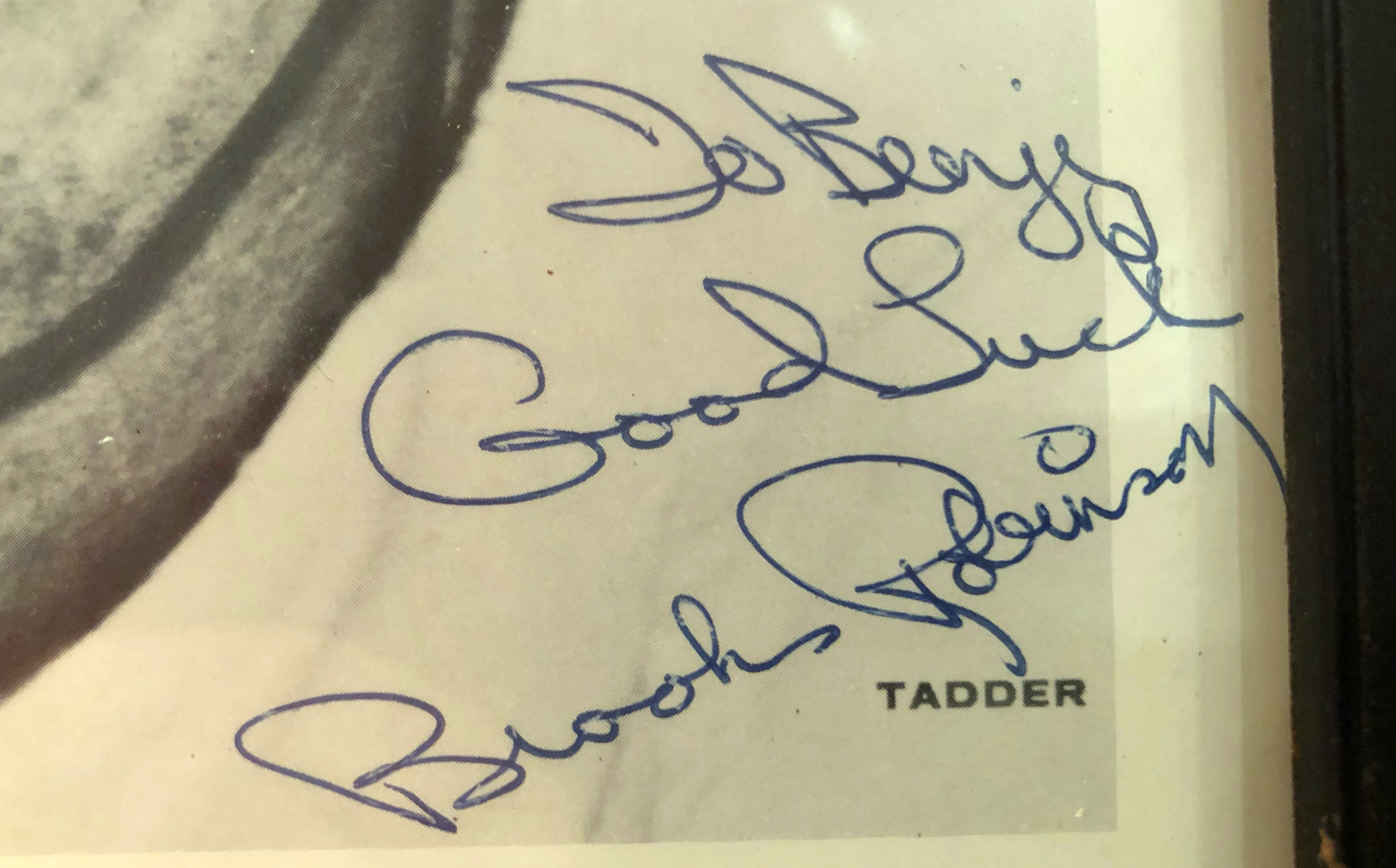 In a photo provided by Ben Walker, a signed photograph of Brooks Robinson to Benjy Walker is seen in Ben Walker's boyhood home, Tuesday, Sept. 26, 2023, in Rockville, Md. Walker received the photo in fourth grade. Robinson, whose deft glovework and folksy manner made him one of the most beloved and accomplished athletes in Baltimore history, has died. He was 86.