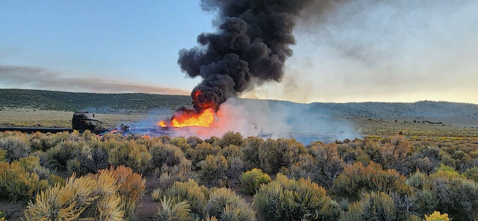 A semitruck is in flames after a crash on state Route 24 near Loa, in Wayne County, Wednesday.