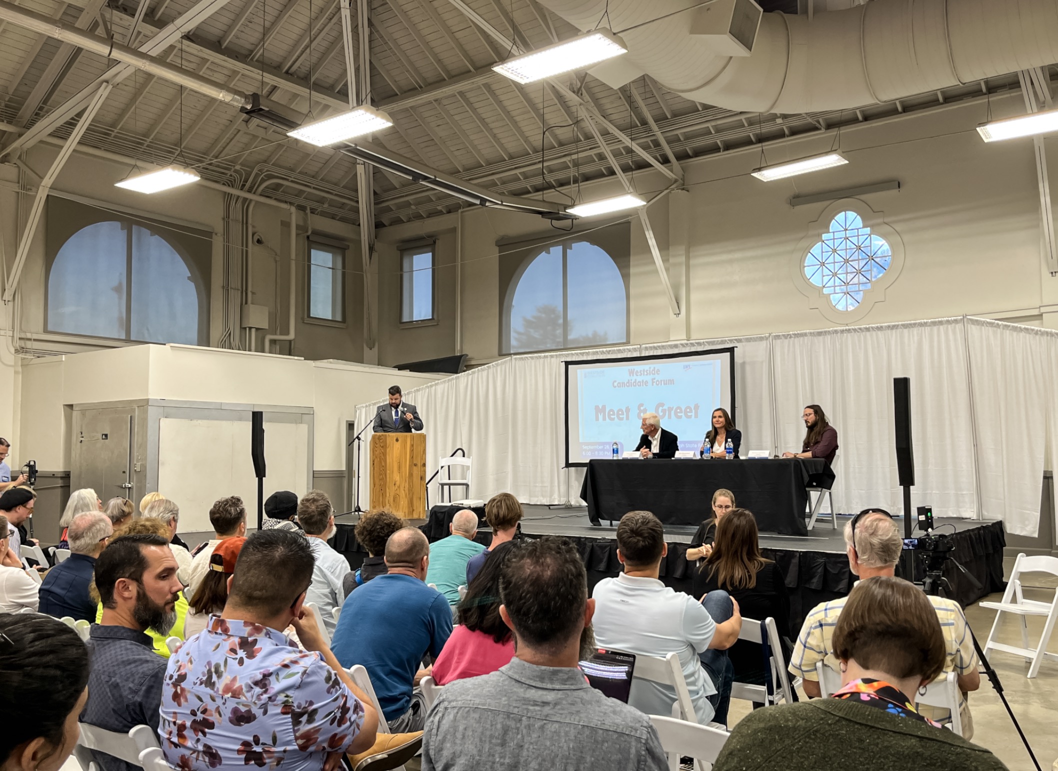 Salt Lake City's three mayoral candidates participate in a forum on west side issues at the Utah State Fairpark's Promontory Building Tuesday evening.
