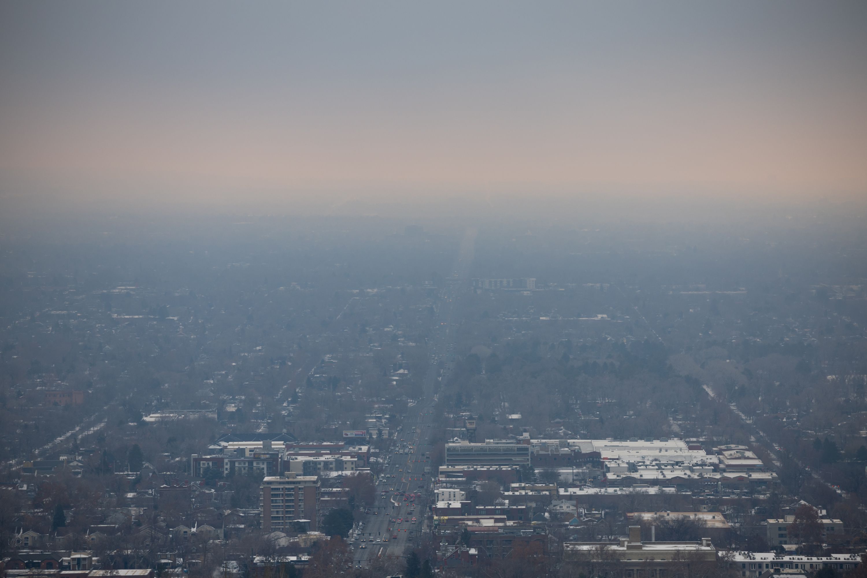 Hazy air is seen in Salt Lake City on Jan. 26. A federal appeals court rejected Utah’s lawsuit over the EPA’s “good neighbor rule,” which will enforce new regulations on how much air pollution from power plants can flow across state lines.
