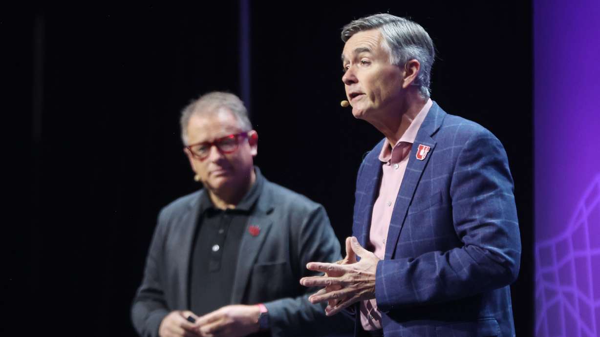 University of Utah President Taylor Randall and Dr. Michael Good, CEO of University of Utah Health, speaks during Silicon Slopes' eighth tech summit at the Delta Center in Salt Lake City Wednesday.