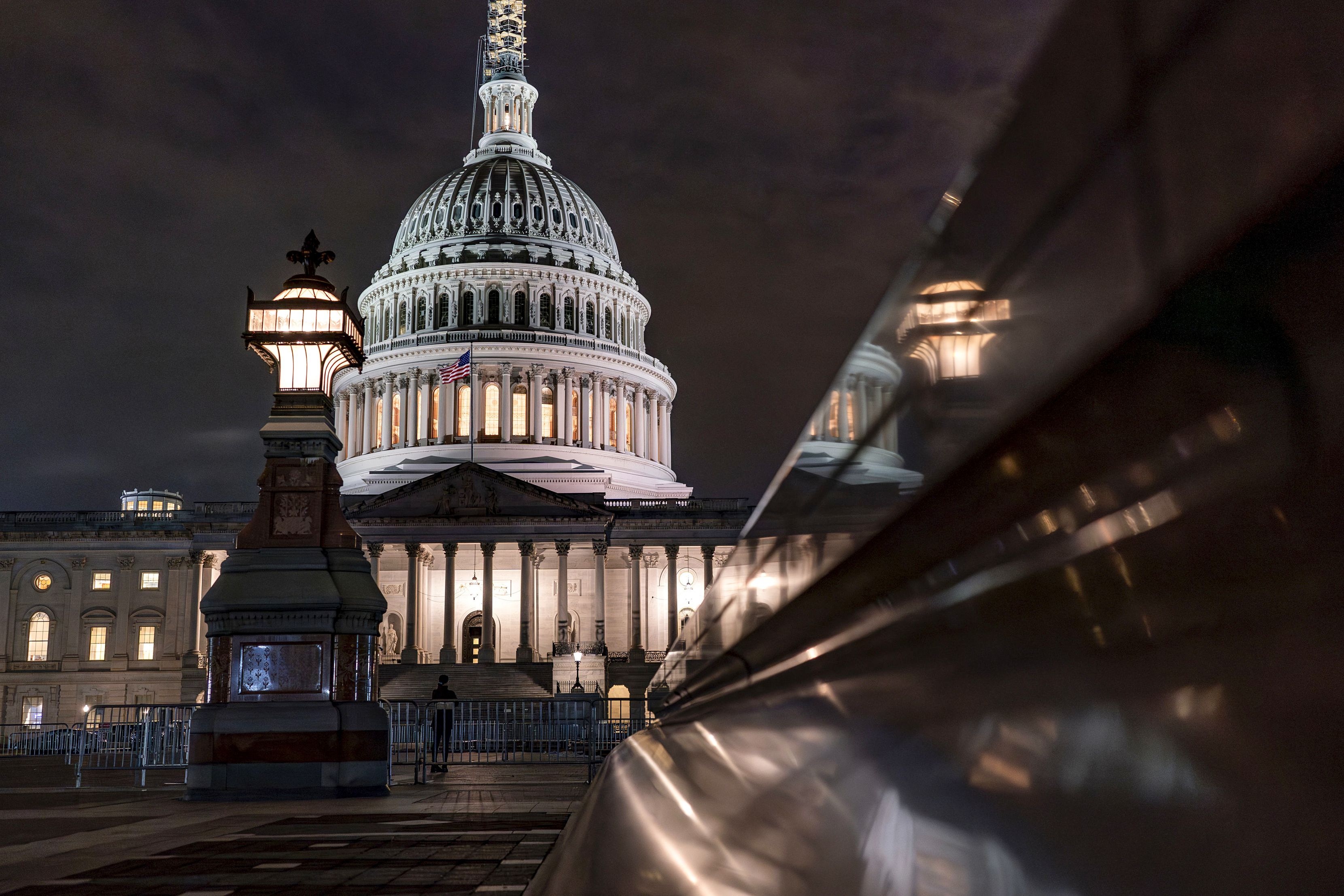 The Capitol is seen late Tuesday night in Washington, as lawmakers work to advance appropriations bills on the House floor. The Republican-controlled House and the Democrat-controlled Senate are starkly divided over very different paths to preventing a federal shutdown.