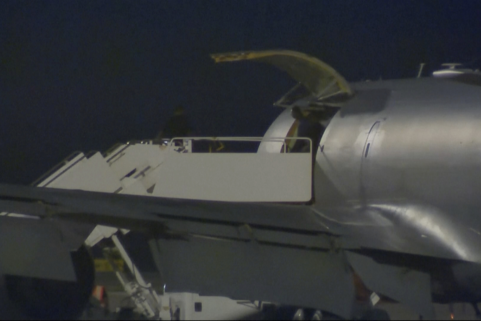 This image made from video provided by KSAT purports to show Pvt. Travis King coming out of an airplane in San Antonio, Texas, early Thursday.