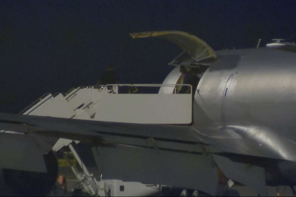 This image made from video provided by KSAT purports to show Pvt. Travis King coming out of an airplane in San Antonio, Texas, early Thursday.