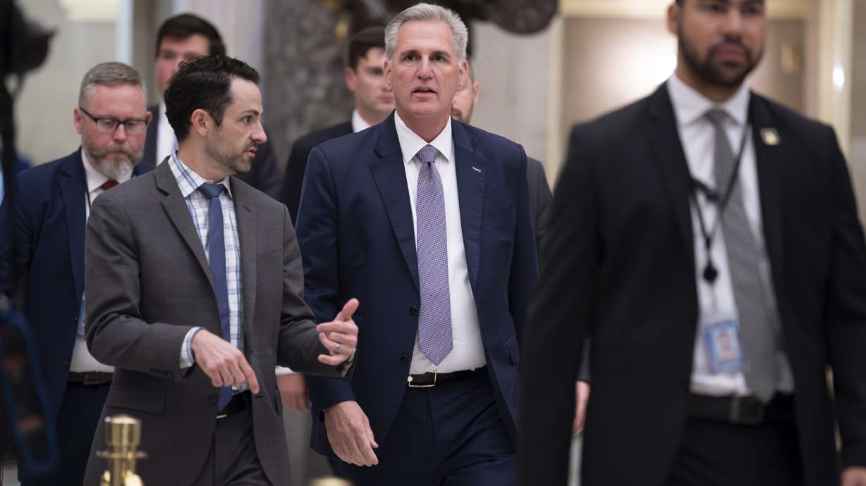 House Speaker Kevin McCarthy, R-Calif., walks to the chamber at the Capitol in Washington, Tuesday night. McCarthy is digging in on his refusal to take up Senate legislation designed to keep the federal government fully running beyond Saturday.