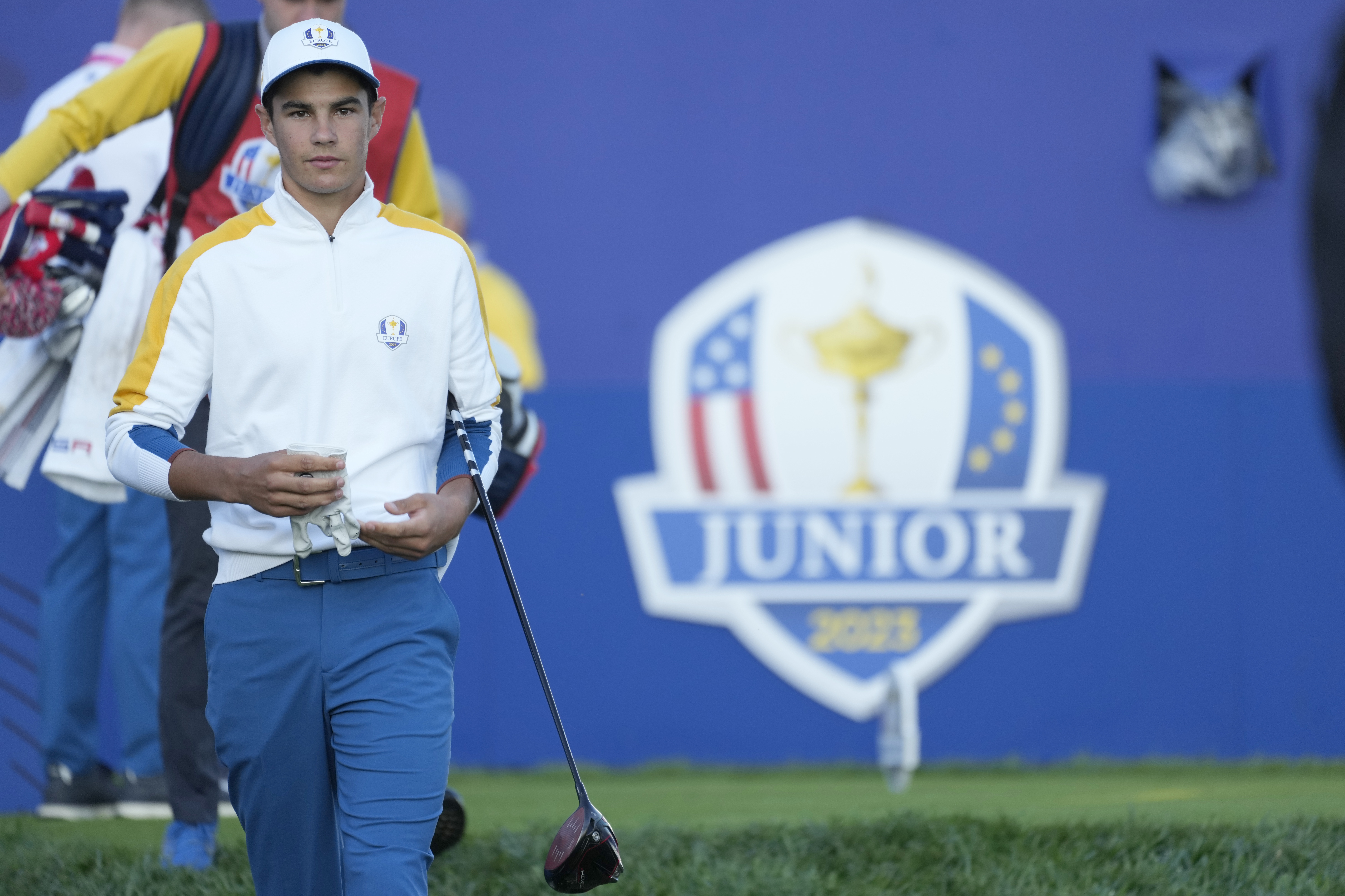Europe's Lev Grinberg, of Ukraine, walks off the 1st tee as he takes part in the Junior Ryder Cup golf tournament at the Marco Simone Golf Club in Guidonia Montecelio, Italy, Thursday, Sept. 28, 2023. The Ryder Cup starts Sept. 29, at the Marco Simone Golf Club.