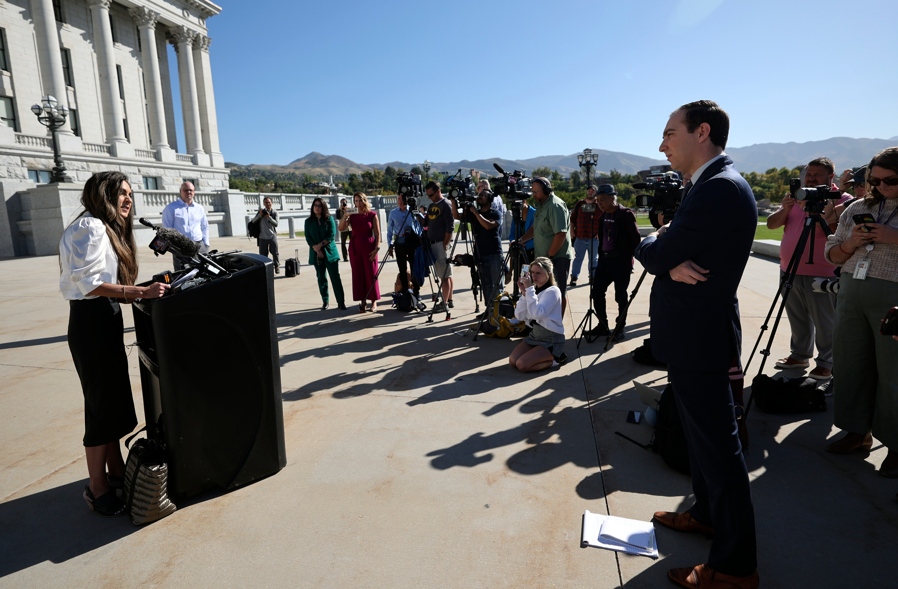 Suzette Rasmussen, an attorney representing former employees and contractors of Operation Underground Railroad, speaks on behalf of her clients in front of the Capitol in Salt Lake City on Thursday.