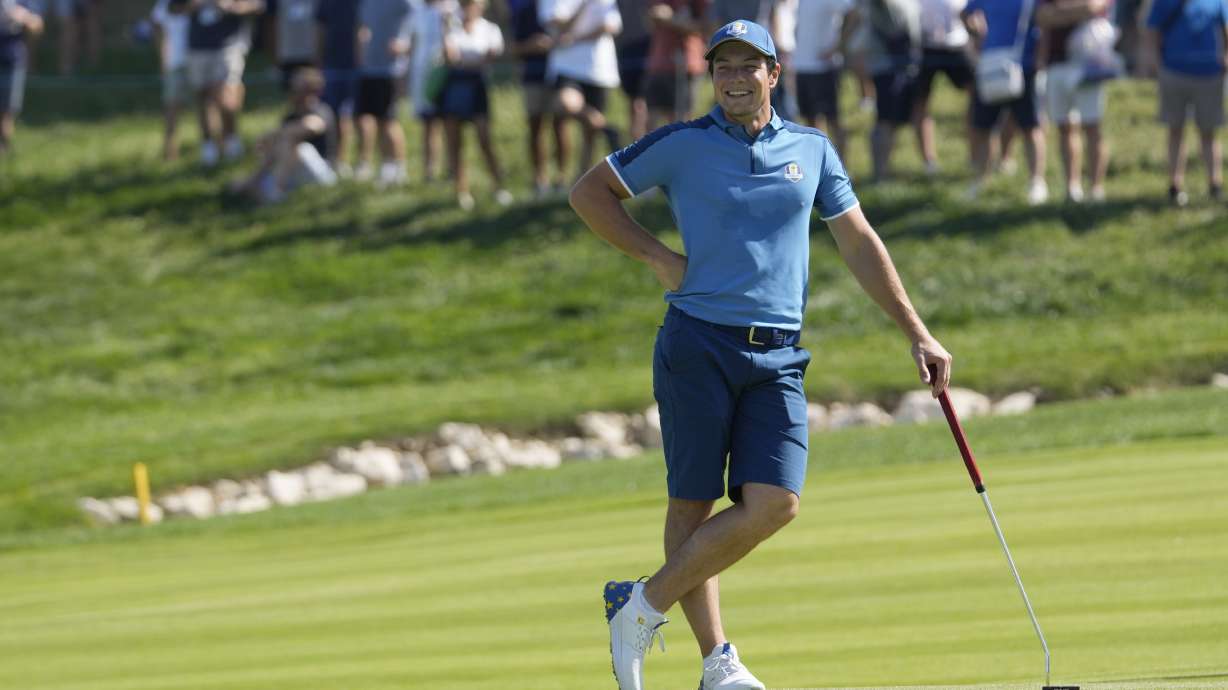 Europe's Viktor Hovland smiles as he waits to putt on the 16th green during a practice round ahead of the Ryder Cup at the Marco Simone Golf Club in Guidonia Montecelio, Italy, Wednesday, Sept. 27, 2023. The Ryder Cup starts Sept. 29, at the Marco Simone Golf Club.