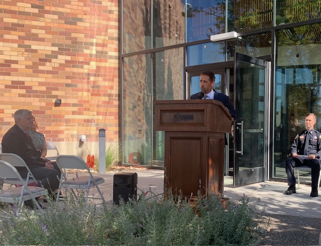 Department of Corrections Executive Director Brian Redd addresses visitors at the ribbon-cutting of the new Timpanogos Community Treatment Center in Orem on Thursday.