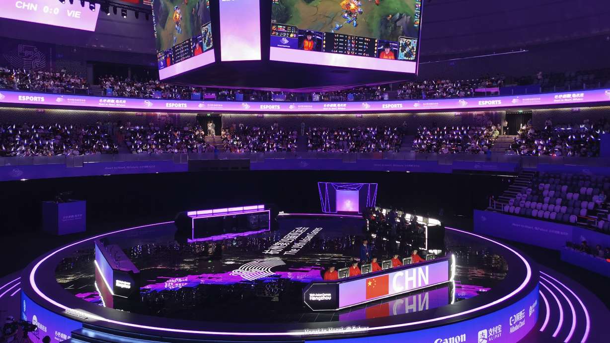 Team China play against Vietnam during the League of Legends esports bronze medal match at the 19th Asian Games in Hangzhou, China, Friday, Sept. 29, 2023. China's League of Legends team hung on Friday to take bronze in the Asian Games esports event, overcoming a strong challenge from Vietnam.