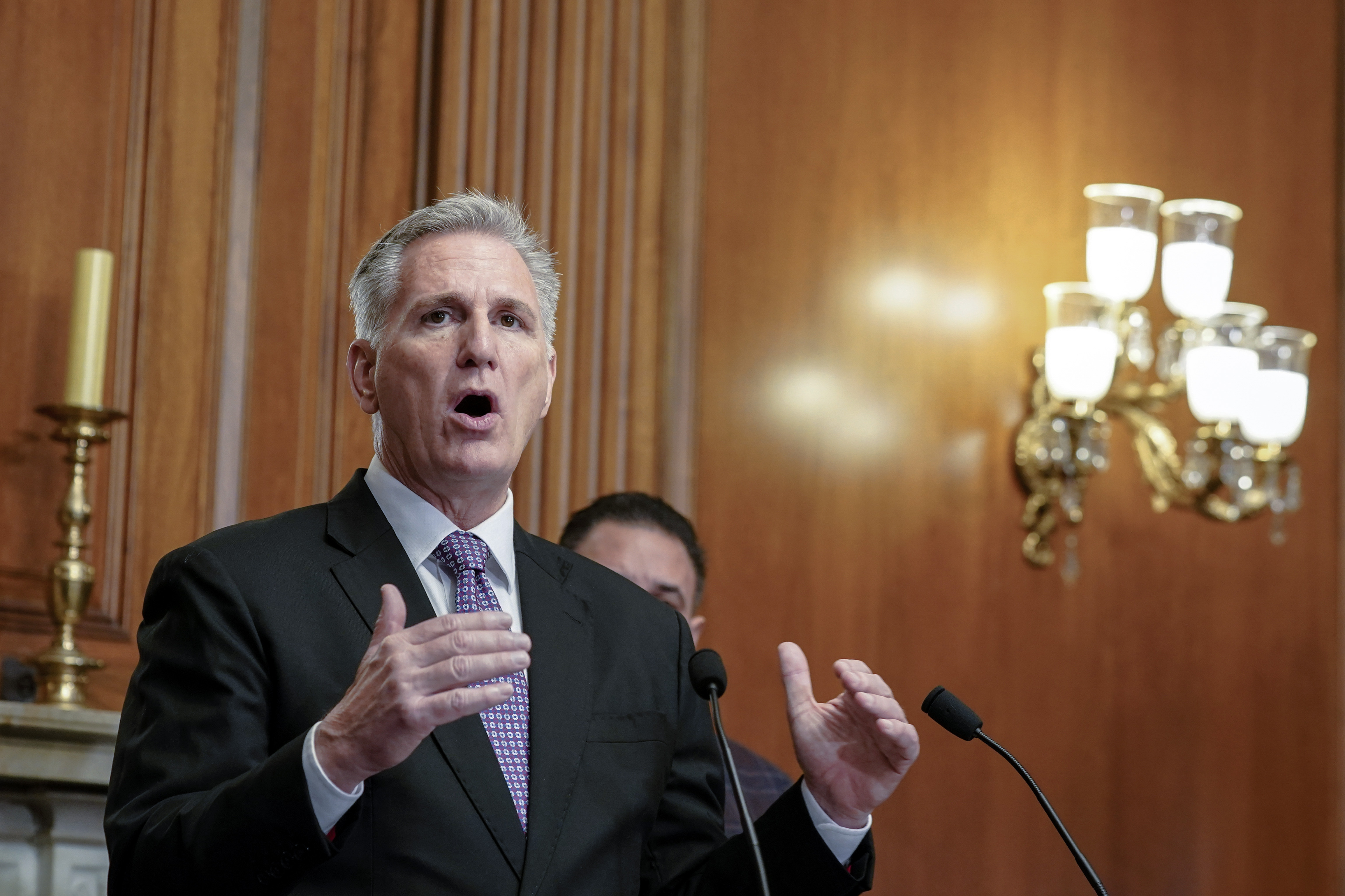 Speaker of the House Kevin McCarthy, R-Calif., speaks to the media about efforts to pass appropriations bills and avert a looming government shutdown, at the Capitol in Washington, Friday.