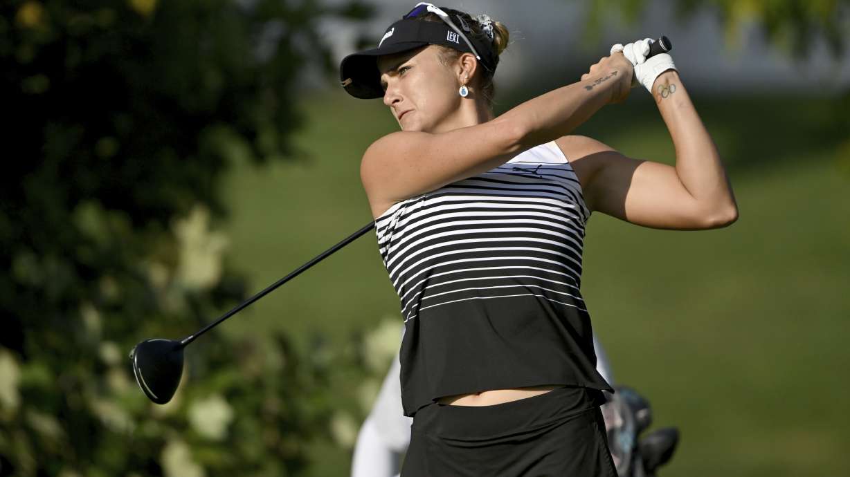CORRECTS TO 2023 NOT 2022 - Lexi Thompson watches her tee shot on the fourth hole during the first round of the LPGA Walmart NW Arkansas Championship golf tournament, Friday, Sept. 29, 2023, in Rogers, Ark.